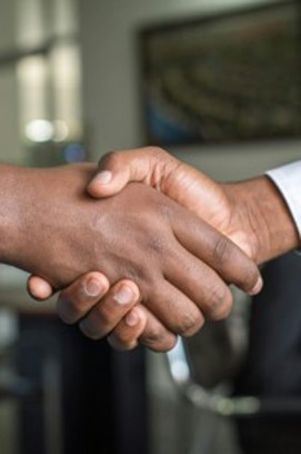 A close-up photo of a handshake