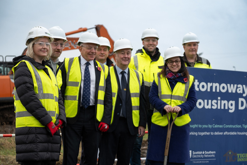 DFM With Representatives Of Partner Organisations Involved In Stornoway Airport Housing Development (Sandy Mactaggart Front Centre, With Poppy)